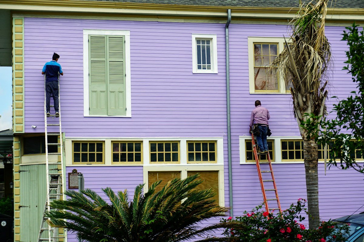 Painters working on a residential exterior